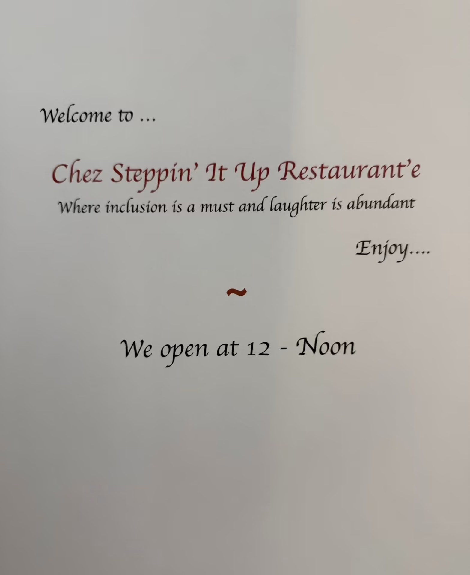 Handwritten menu card reading Chez Steppin' It Up Restaurant'e