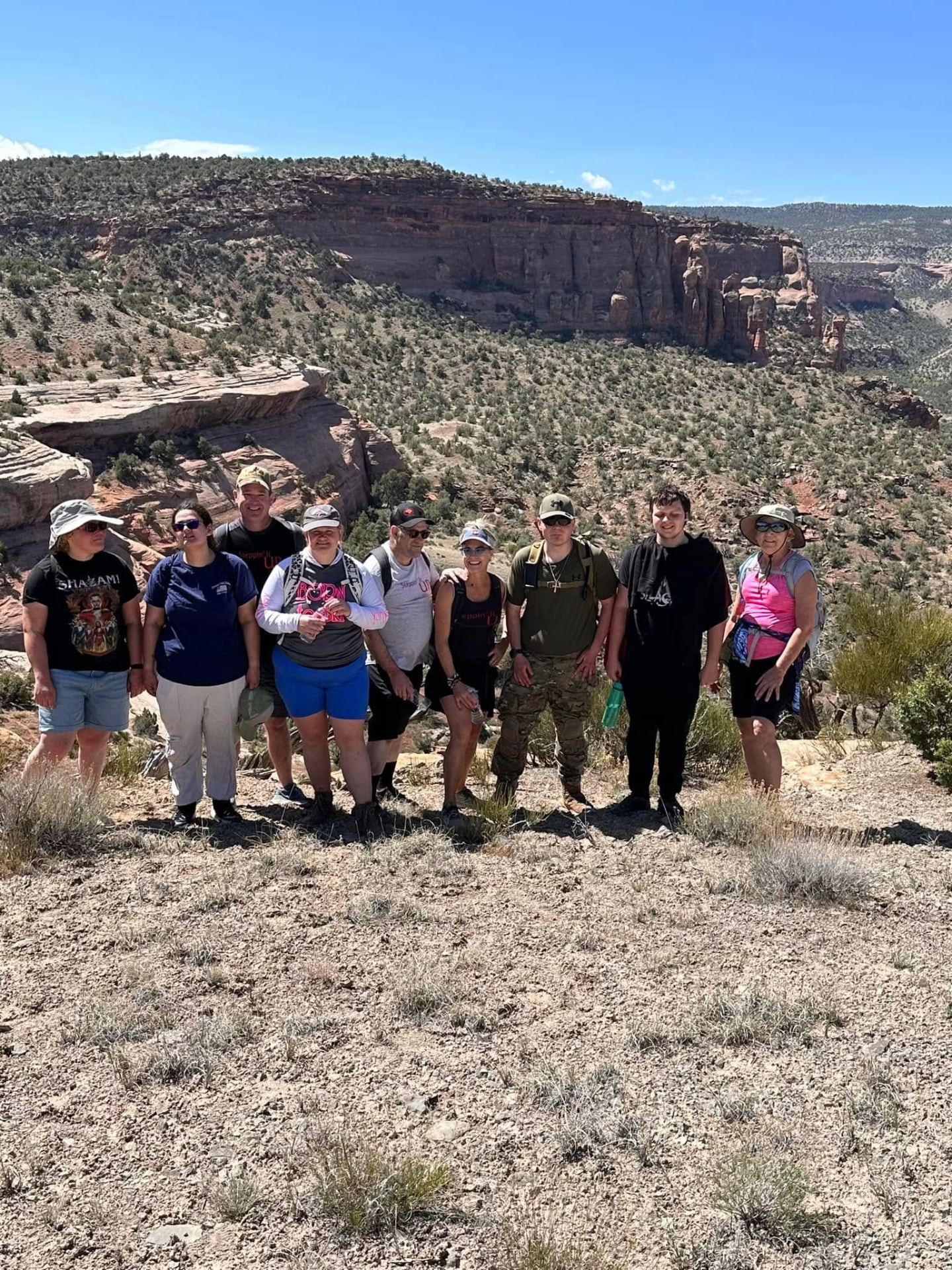 Steppin' It Up athletes and coaches on a canyon overlook hike